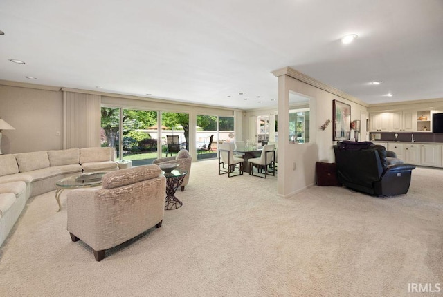 570 Golden Pl, Lafayette, IN 47905 - living area with light colored carpet, ornamental molding, and recessed lighting