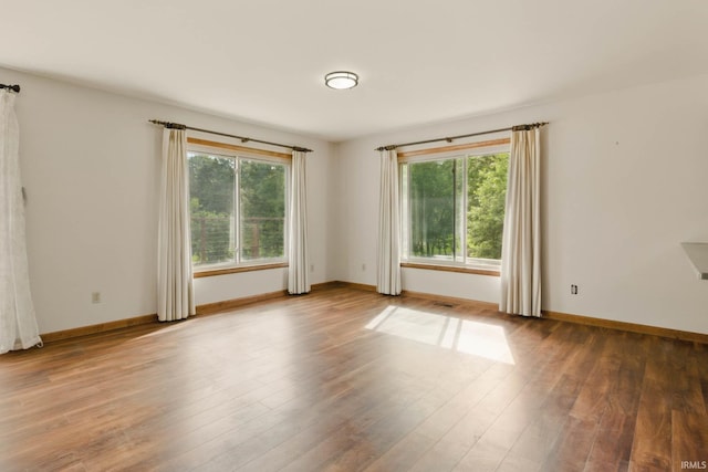 951 W Shepherds Ln, Santa Claus, IN 47579 - empty room with wood finished floors and baseboards