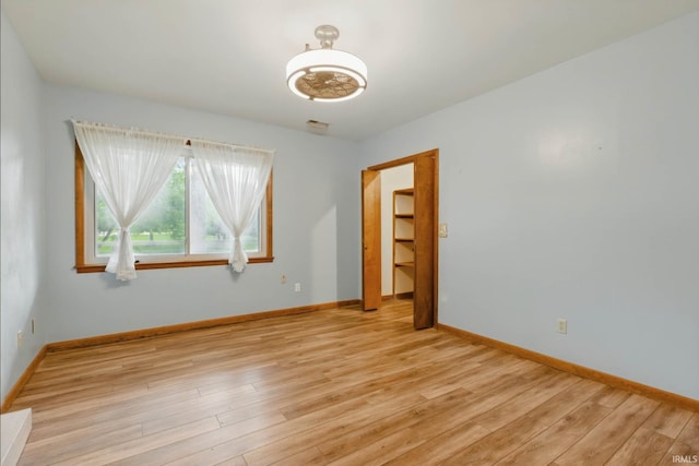 951 W Shepherds Ln, Santa Claus, IN 47579 - spare room with light wood-style floors and baseboards