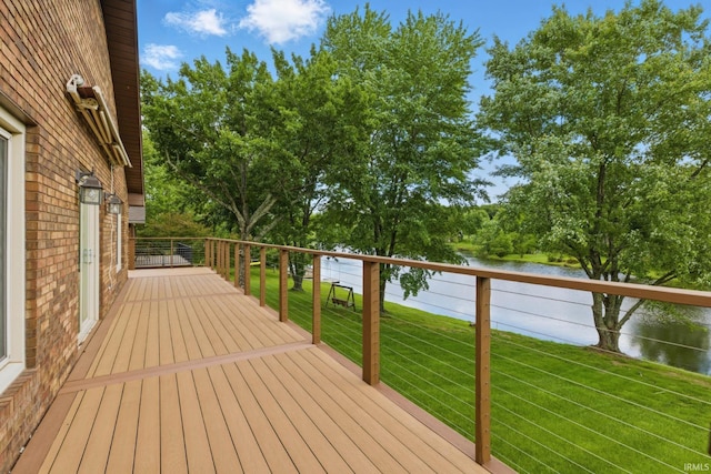 951 W Shepherds Ln, Santa Claus, IN 47579 - wooden terrace featuring a water view and a lawn