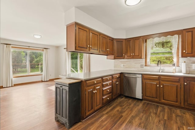 951 W Shepherds Ln, Santa Claus, IN 47579 - kitchen with dishwasher, a sink, light countertops, and healthy amount of natural light