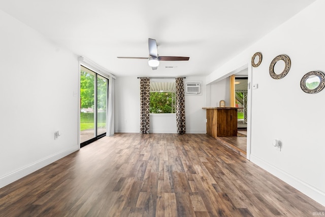730 E Sherman St, Marion, IN 46952 - unfurnished room with a wall mounted AC, wood finished floors, a ceiling fan, and baseboards