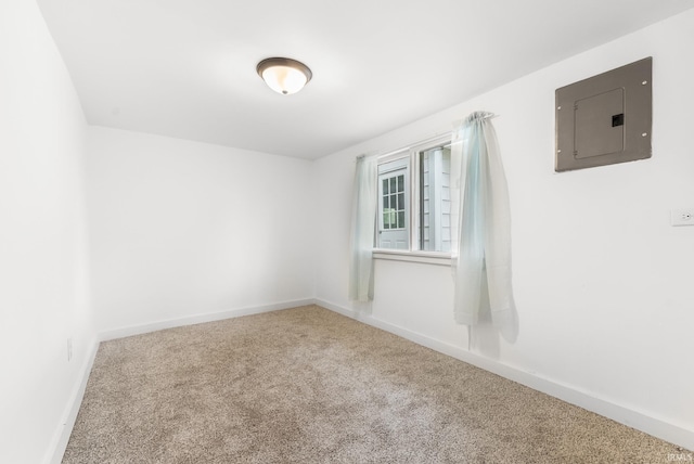 730 E Sherman St, Marion, IN 46952 - unfurnished room with electric panel, carpet floors, and baseboards