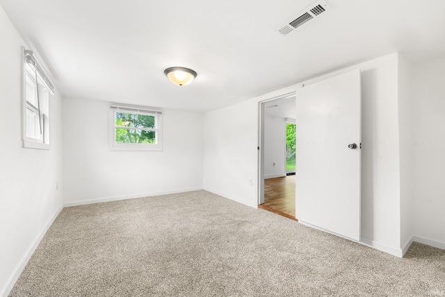 730 E Sherman St, Marion, IN 46952 - carpeted empty room featuring baseboards