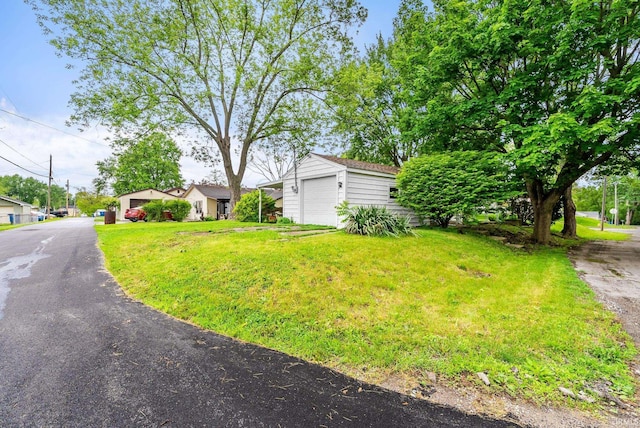 730 E Sherman St, Marion, IN 46952 - view of front of property with a front lawn and an outbuilding