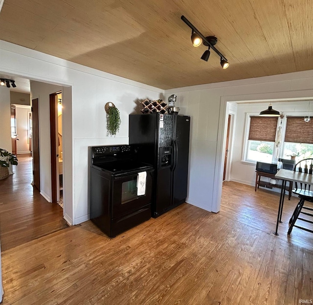 375 E Harrison Ave, Wabash, IN 46992 - kitchen featuring black appliances, wood finished floors, and wood ceiling