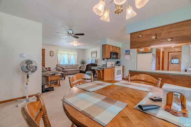 11542 S 700 E, Lafontaine, IN 46940 - dining area featuring a chandelier, a ceiling fan, baseboards, and a textured ceiling
