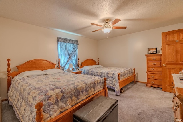 11542 S 700 E, Lafontaine, IN 46940 - bedroom featuring light carpet, ceiling fan, a textured ceiling, and baseboards