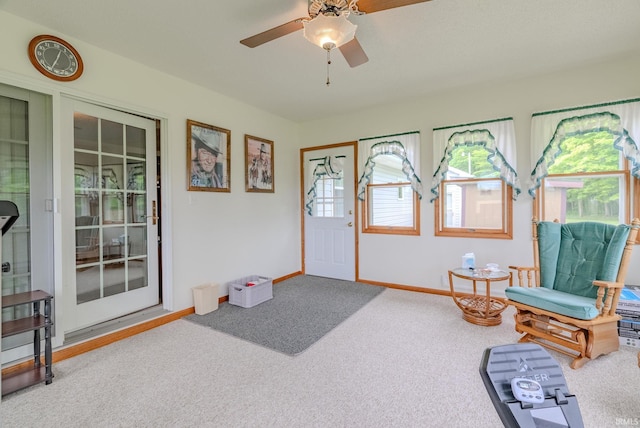 11542 S 700 E, Lafontaine, IN 46940 - living area with carpet flooring, a ceiling fan, and baseboards
