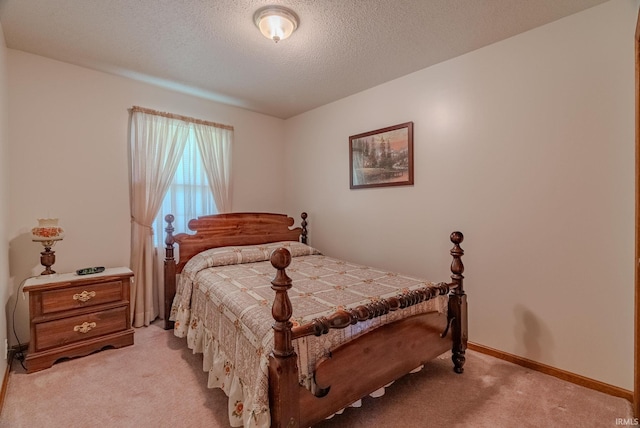 11542 S 700 E, Lafontaine, IN 46940 - bedroom featuring light carpet, a textured ceiling, and baseboards