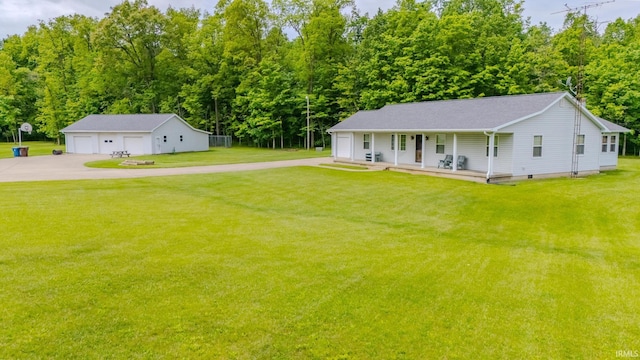 11542 S 700 E, Lafontaine, IN 46940 - view of front of home with a porch, a detached garage, an outbuilding, and a front yard