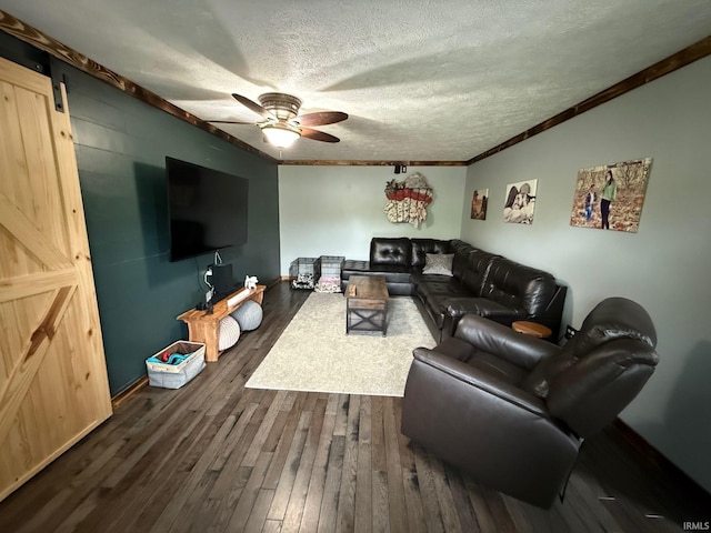2782 W State Road 32nd Rd, Covington, IN 47932 - living room with a textured ceiling, a ceiling fan, dark wood finished floors, crown molding, and baseboards