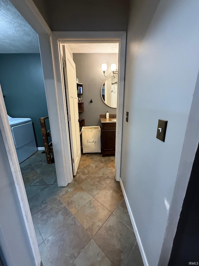 2782 W State Road 32nd Rd, Covington, IN 47932 - hall featuring a textured ceiling and baseboards
