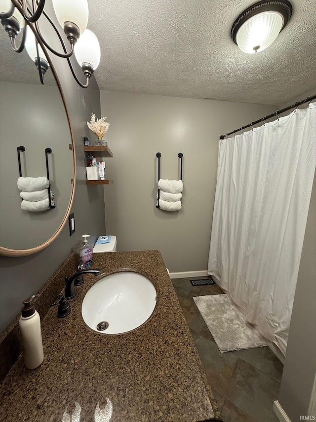 2782 W State Road 32nd Rd, Covington, IN 47932 - full bathroom featuring vanity, a textured ceiling, and a shower with shower curtain