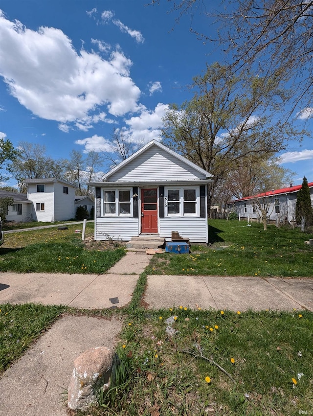 615 Mercer Ave, Goshen, IN 46528 - view of front of home with a front lawn