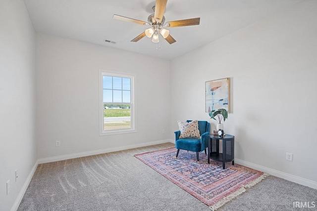 2487 Fiona Dr, Kokomo, IN 46902 - living area featuring carpet flooring, a ceiling fan, and baseboards