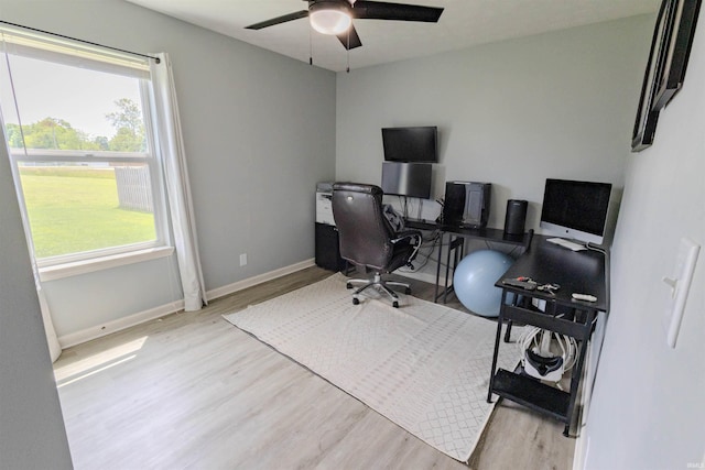2141 Rutherford Dr, West Lafayette, IN 47906 - home office with wood finished floors, healthy amount of natural light, ceiling fan, and baseboards