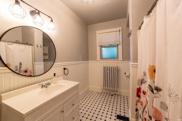 3601 Stringtown Rd, Evansville, IN 47711 - bathroom featuring radiator, a wainscoted wall, vanity, and a shower with shower curtain