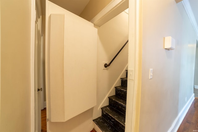 3601 Stringtown Rd, Evansville, IN 47711 - stairs featuring wood finished floors and baseboards
