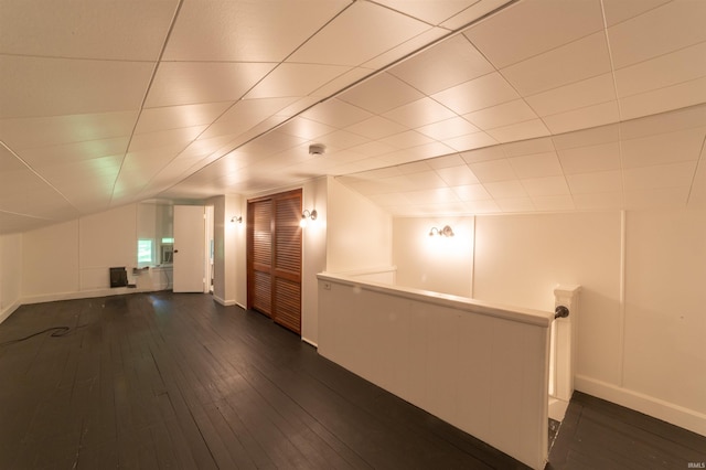 3601 Stringtown Rd, Evansville, IN 47711 - bonus room featuring baseboards and dark wood finished floors
