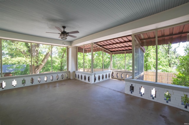 3601 Stringtown Rd, Evansville, IN 47711 - unfurnished sunroom with ceiling fan