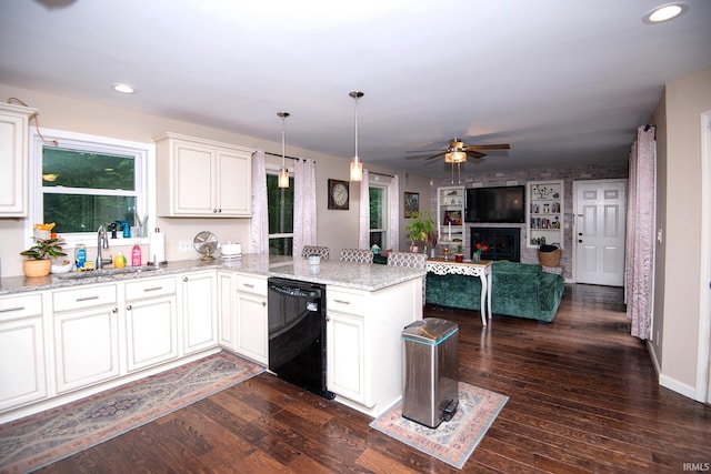 101 Hendron Hills Dr, Vincennes, IN 47591 - kitchen with black dishwasher, a sink, a peninsula, ceiling fan, and recessed lighting