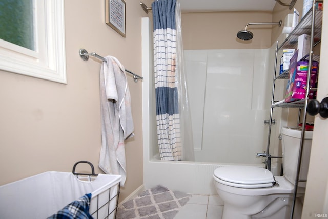 101 Hendron Hills Dr, Vincennes, IN 47591 - full bathroom featuring toilet, shower / bath combo with shower curtain, and tile patterned floors