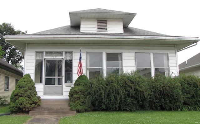 215 S Main St, Oakland City, IN 47660 - view of front facade featuring a shingled roof