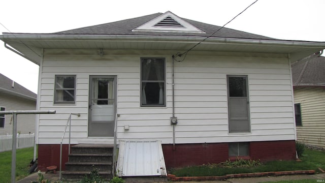 215 S Main St, Oakland City, IN 47660 - rear view of property with roof with shingles and entry steps