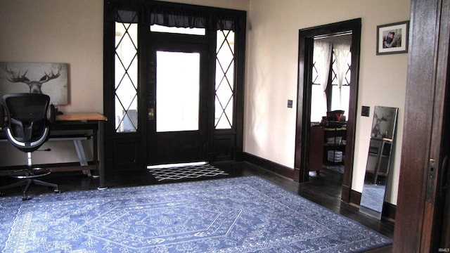 215 S Main St, Oakland City, IN 47660 - entrance foyer featuring wood finished floors and baseboards