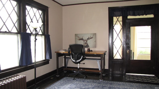 215 S Main St, Oakland City, IN 47660 - office space with radiator, plenty of natural light, baseboards, and crown molding