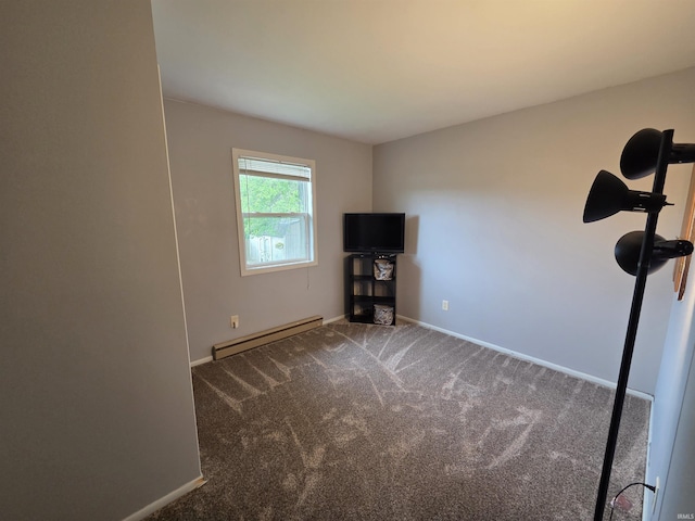 7823 Knightswood Dr, Fort Wayne, IN 46819 - workout room featuring a baseboard heating unit, carpet flooring, and baseboards