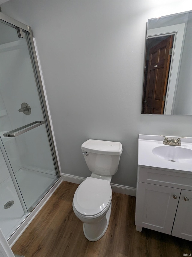 300 E Taylor St, Kokomo, IN 46901 - full bathroom featuring vanity, wood finished floors, and baseboards