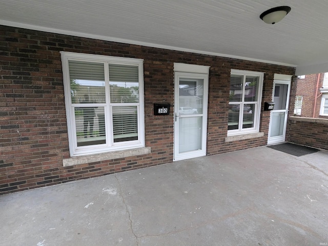 300 E Taylor St, Kokomo, IN 46901 - view of exterior entry featuring brick siding