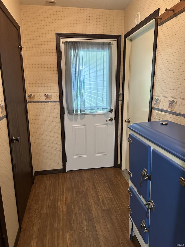 1913 Mckibben St, Wabash, IN 46992 - entryway featuring wallpapered walls and dark wood finished floors