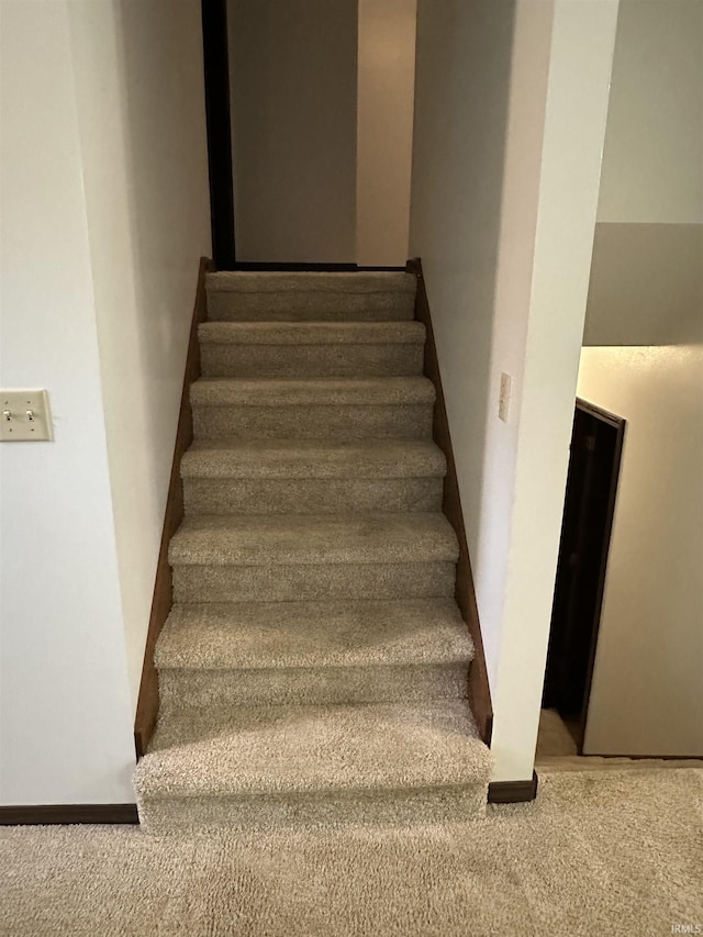 1913 Mckibben St, Wabash, IN 46992 - stairway featuring carpet flooring