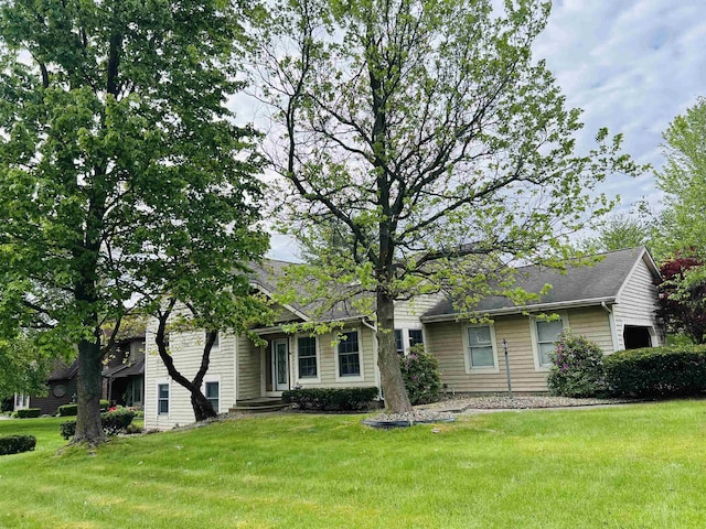 15626 Cold Spring Ct, Granger, IN 46530 - view of front of property with a front yard and a garage