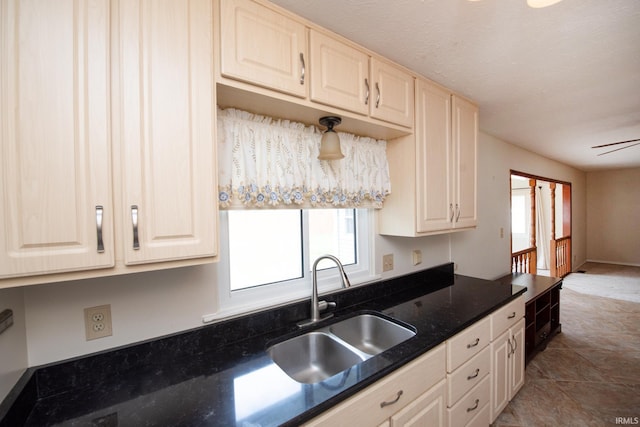 910 S Southland Dr, Lafayette, IN 47909 - kitchen with a sink and dark stone countertops