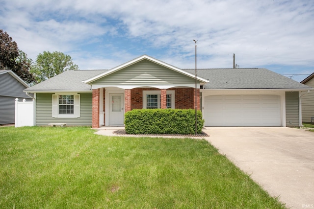 910 S Southland Dr, Lafayette, IN 47909 - single story home with a garage, concrete driveway, a front lawn, a shingled roof, and brick siding