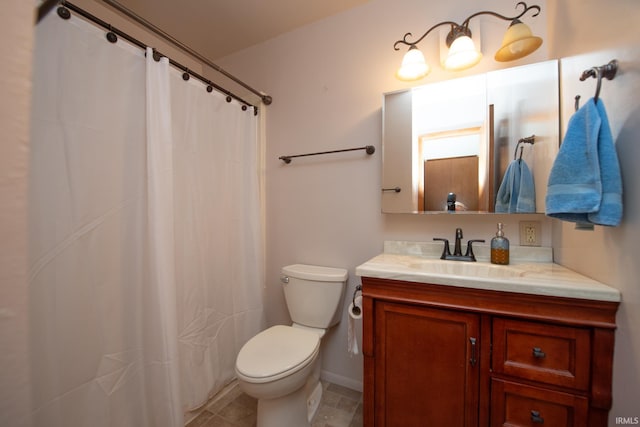 910 S Southland Dr, Lafayette, IN 47909 - bathroom featuring toilet, vanity, baseboards, and a shower with shower curtain