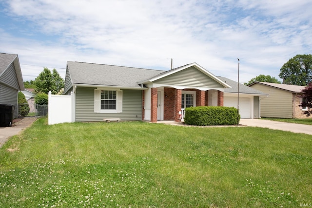 910 S Southland Dr, Lafayette, IN 47909 - ranch-style home featuring concrete driveway, a garage, a porch, brick siding, and roof with shingles
