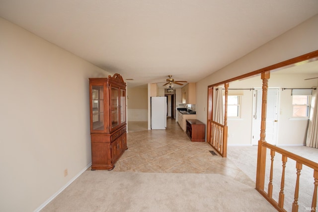 910 S Southland Dr, Lafayette, IN 47909 - corridor featuring plenty of natural light, baseboards, and light colored carpet