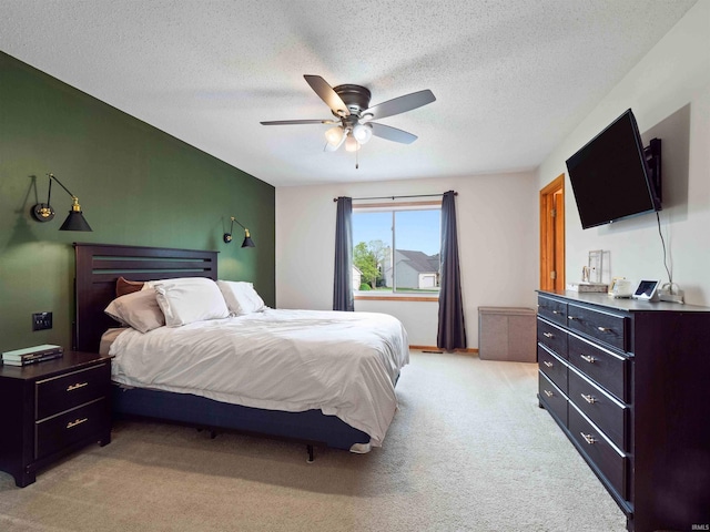 3335 Firethorne Ct, Fort Wayne, IN 46814 - bedroom with light carpet, a ceiling fan, and a textured ceiling