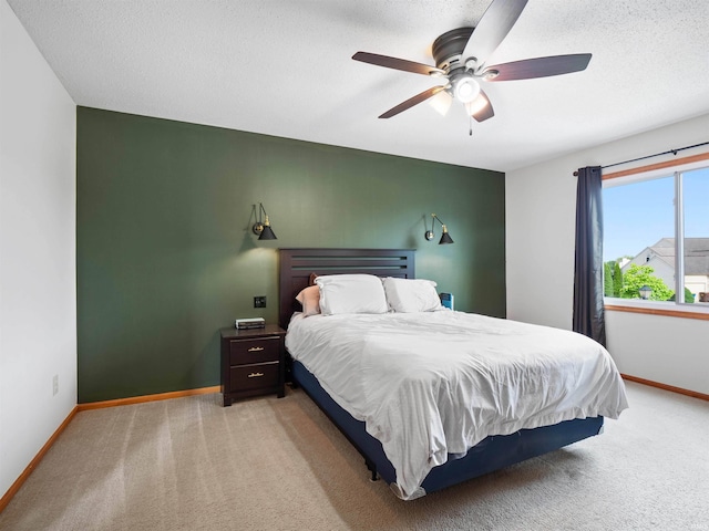 3335 Firethorne Ct, Fort Wayne, IN 46814 - carpeted bedroom featuring baseboards, a ceiling fan, and a textured ceiling