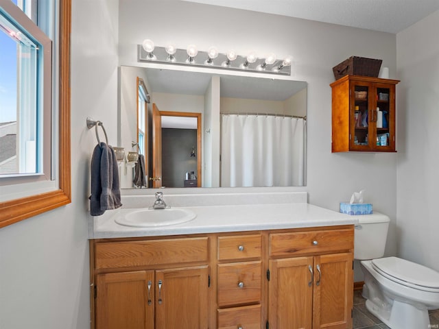 3335 Firethorne Ct, Fort Wayne, IN 46814 - full bathroom featuring vanity, toilet, and tile patterned floors