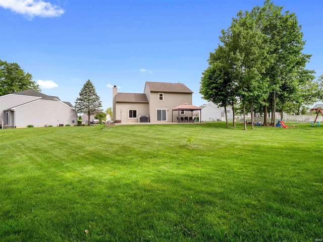 3335 Firethorne Ct, Fort Wayne, IN 46814 - view of grassy yard featuring a gazebo and a playground