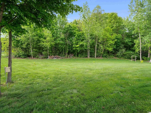 3335 Firethorne Ct, Fort Wayne, IN 46814 - view of grassy yard featuring a forest view