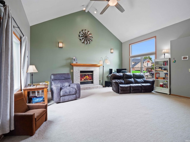3335 Firethorne Ct, Fort Wayne, IN 46814 - living area featuring high vaulted ceiling, carpet floors, a ceiling fan, a brick fireplace, and beam ceiling