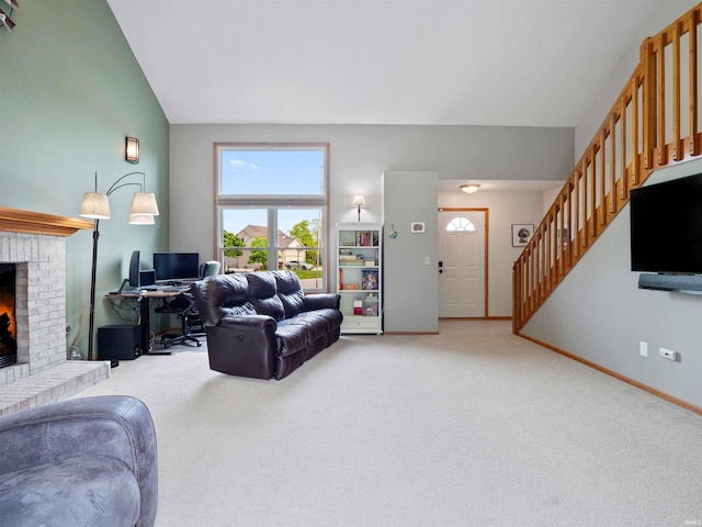 3335 Firethorne Ct, Fort Wayne, IN 46814 - living area featuring a fireplace, a desk, light colored carpet, stairway, and lofted ceiling