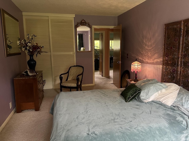 504 S Stratton Way, Decatur, IN 46733 - carpeted bedroom featuring a closet, baseboards, and a textured ceiling
